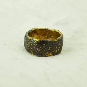 Primitive textured silver and gold band
