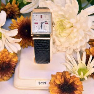 Yellow Gold Chalet Ruby and Diamond Watch