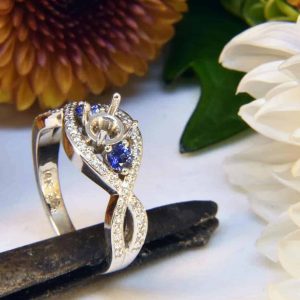 White Gold Diamond Engagement Ring Semi-Mount with Sapphire Side Stones and Infinity Helix Diamond Melee