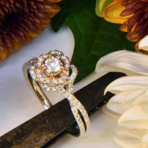 White and Rose Gold Diamond Engagement Ring with Flower Halo