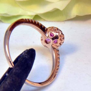 Rose Gold Oval Pink Sapphire Engagement Ring with Diamond Halo