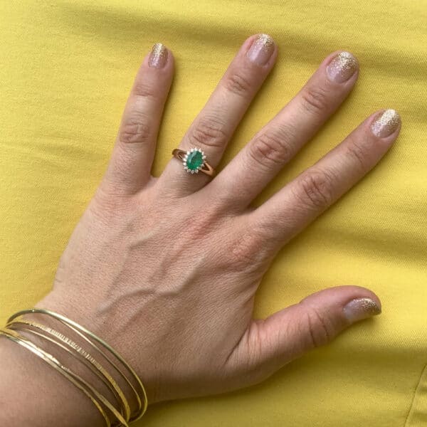 14K YG Ring + Oval Emerald + Diam Halo+ Split Shank 14K YG Ring + Oval Emerald + Diam Halo+ Split Shank