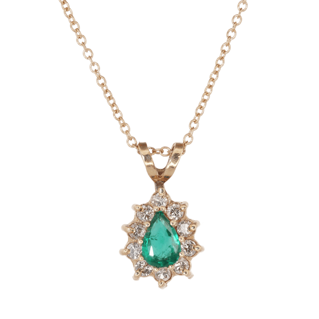 Yellow gold estate pear-cut emerald and diamond halo
