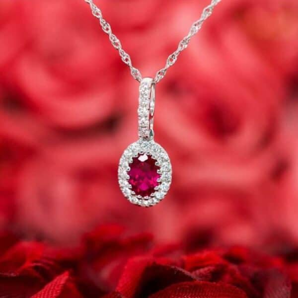 14K WG Oval Ruby + Diam Halo & Bale + Chain 14K WG Oval Ruby + Diam Halo & Bale + Chain