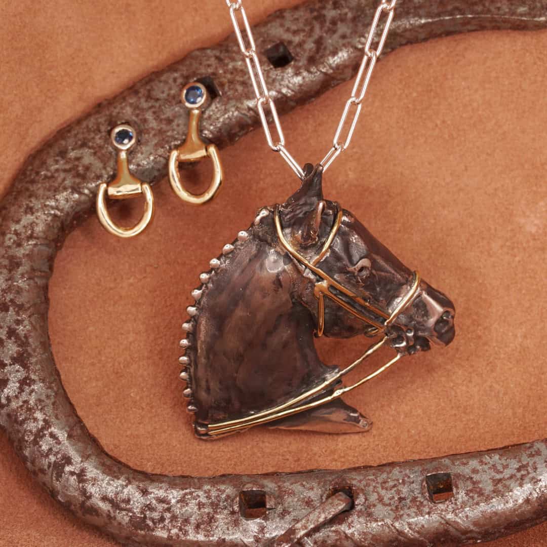 Yellow gold sapphire bit earrings and blackened silver dressage horse head pendant
