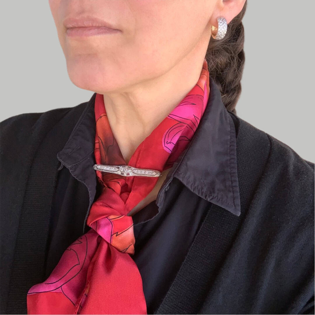 Scarf with brooch pin